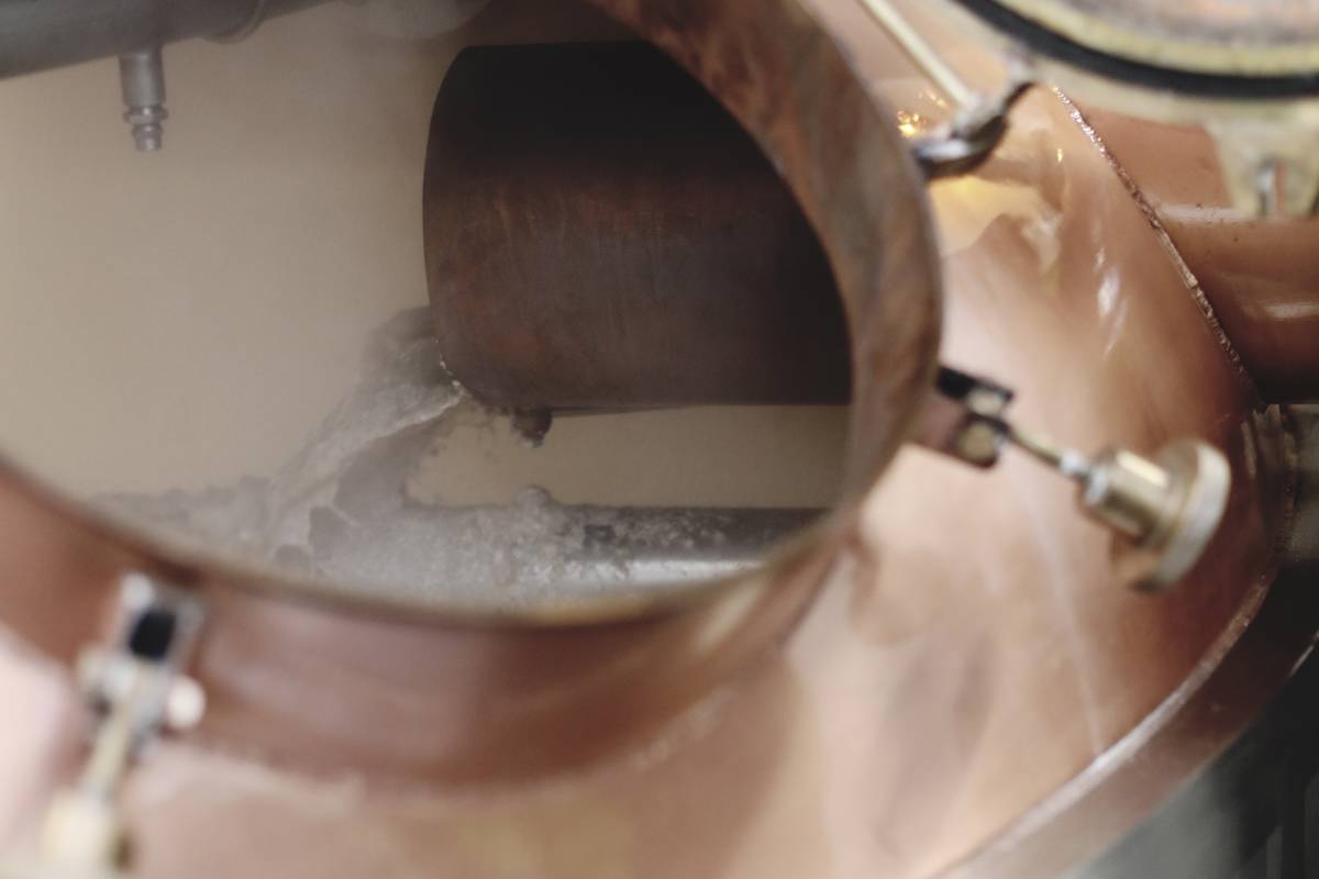 Water and grist mixture entering mash tun at The Clydeside Distillery
