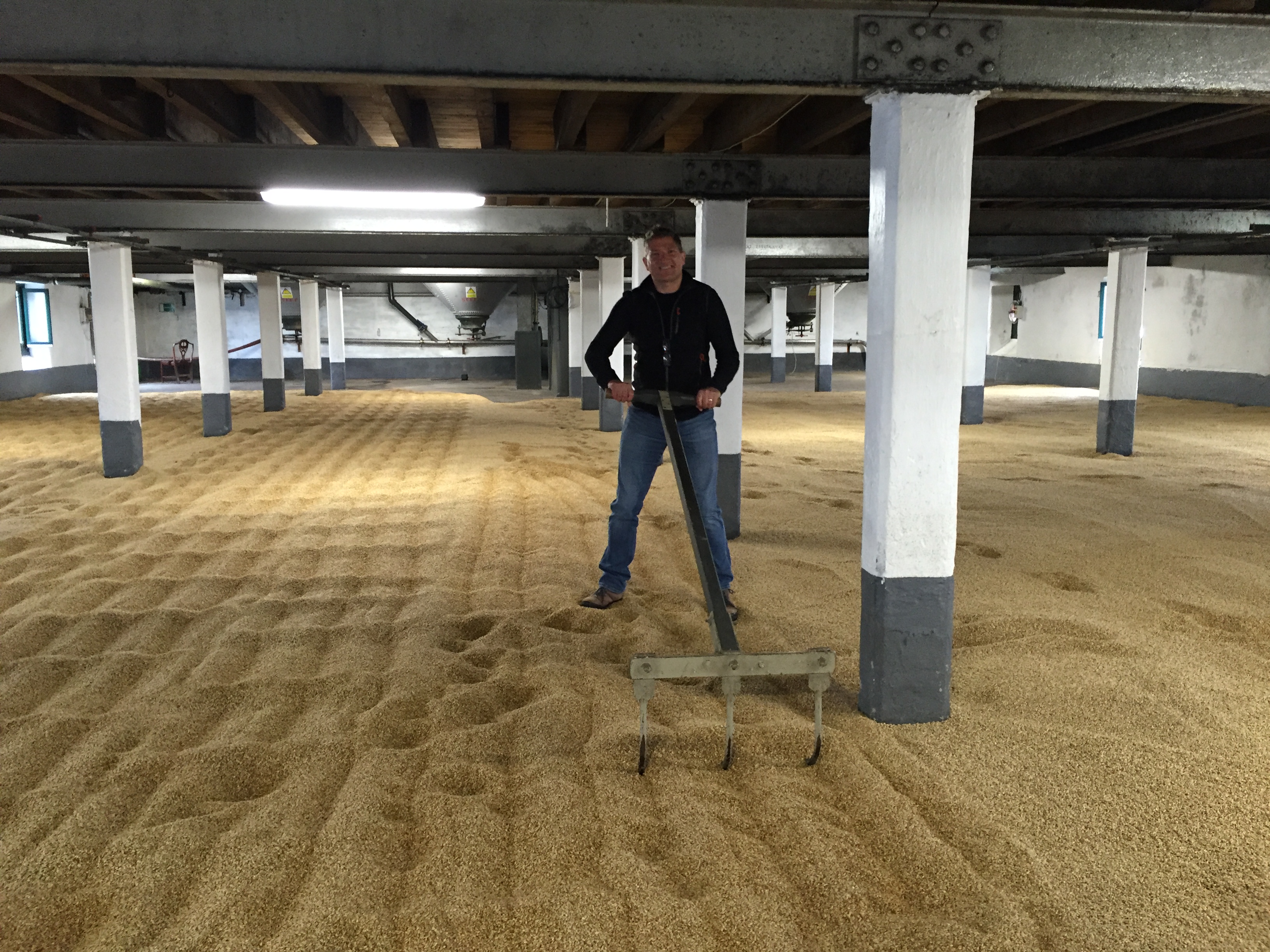 Robin Working The Malt At Laphroaig