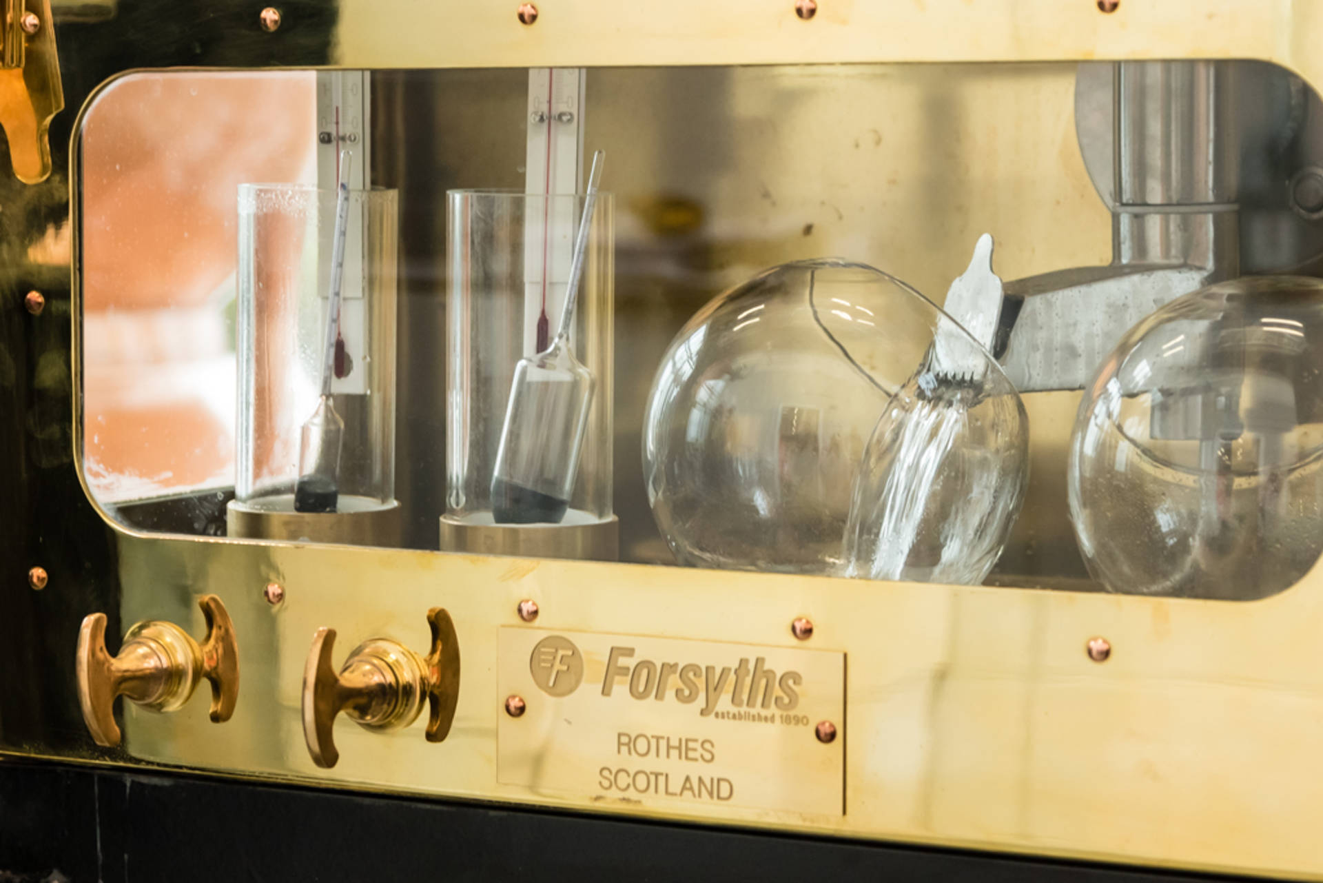 New Make Spirit running through the spirit safe at The Clydeside Distillery