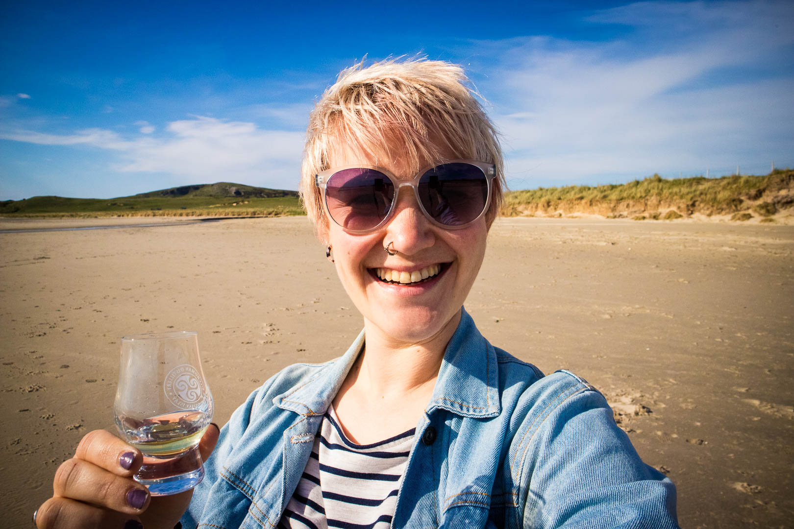 Kathi Kamleitner With A Dram Of Whisky On The Beach