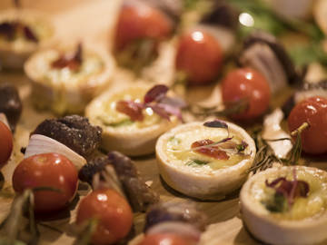 Focused-shot of the canapé selection on wooden board