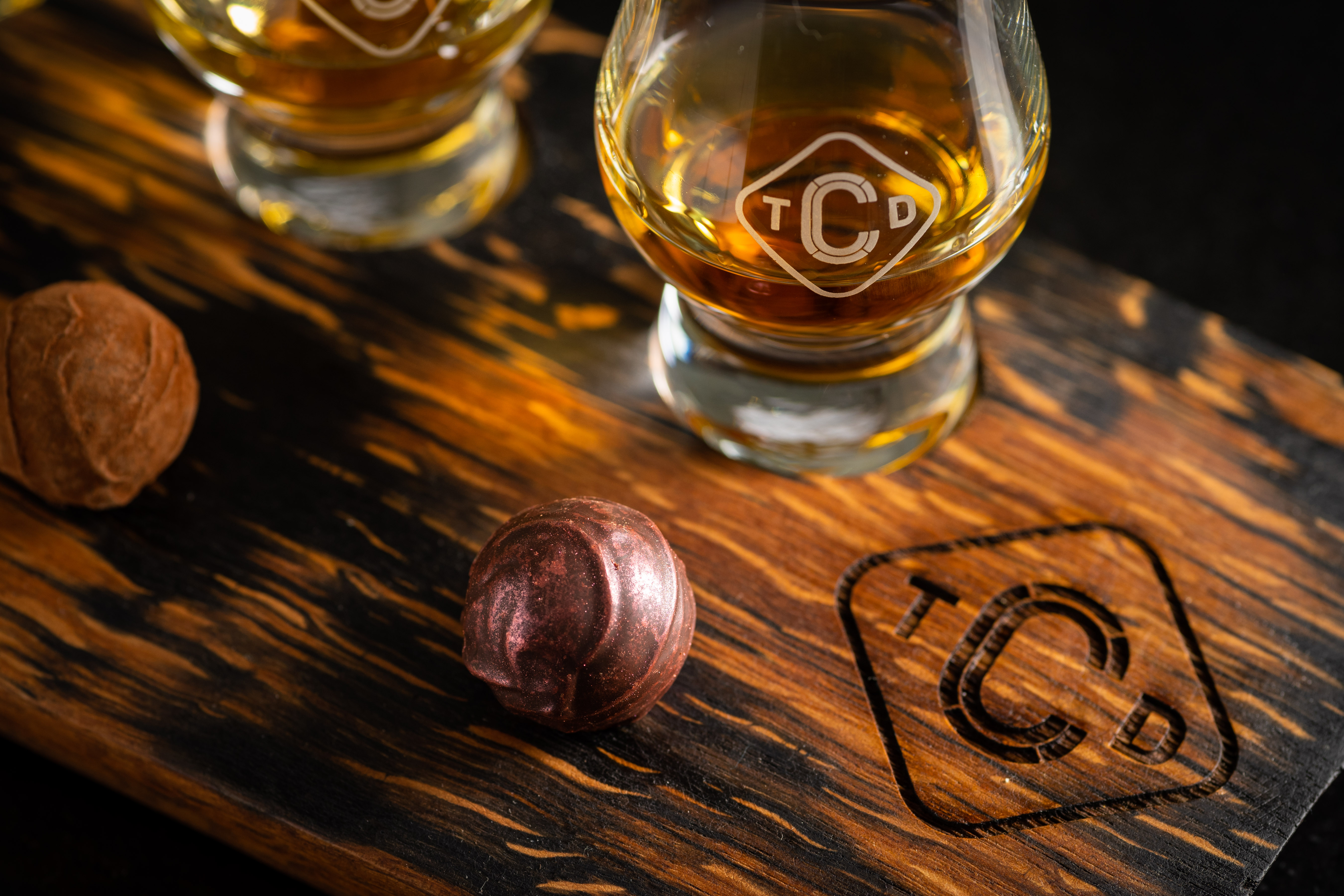One of the chocolate & whisky pairings, includes dram glass and coated truffle chocolate