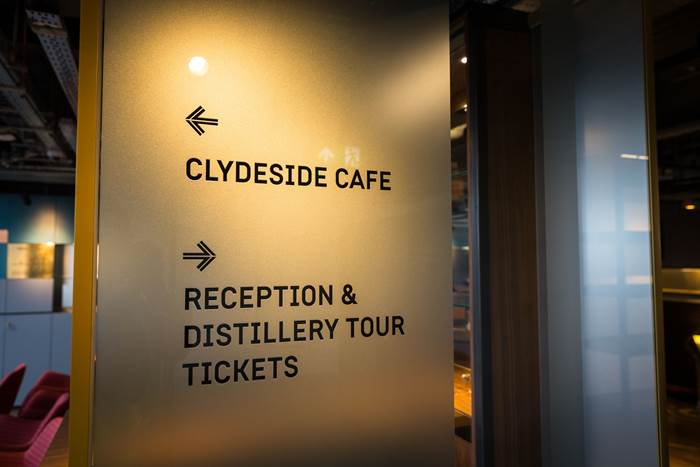 Directional signage to sign post Clydeside Café and Reception